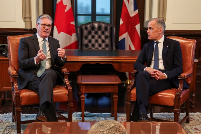 Canada's Prime Minister Mark Carney attends a bilateral meeting with Britain's Prime Minister Keir Starmer, before the start of the G7 summit, at Parliament Hill in Ottawa, Ontario Canada, June 15, 2025. REUTERS/Suzanne Plunkett/Pool