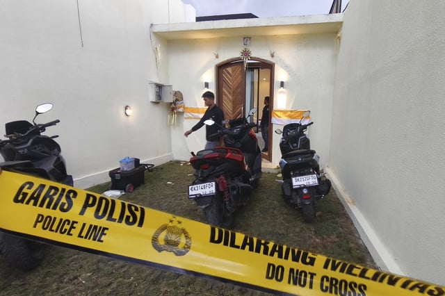 Plain-clothed police officers are seen at a villa where a shooting that led to the death of an Australian man reportedly occurred, in Badung on the resort island of Bali, Indonesia on June 14, 2025.