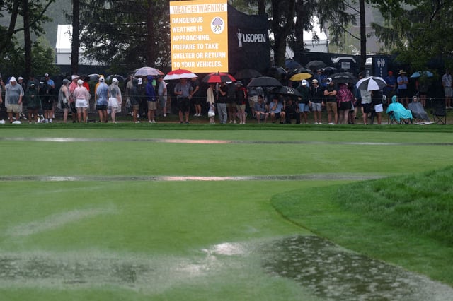 OAKMONT, PENNSYLVANIA - JUNE 15: A view of the 18th green as a storm rolls in causing play to be suspended during the final round of the 125th U.S. OPEN at Oakmont Country Club on June 15, 2025 in Oakmont, Pennsylvania. (Photo by Warren Little/Getty Images)