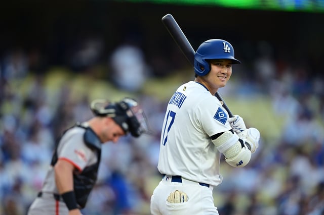 Shohei Ohtani #17 of the Los Angeles Dodgers goes to bat against the San Francisco Giants in the first inning at Dodger Stadium on June 13, 2025 in Los Angeles, California.