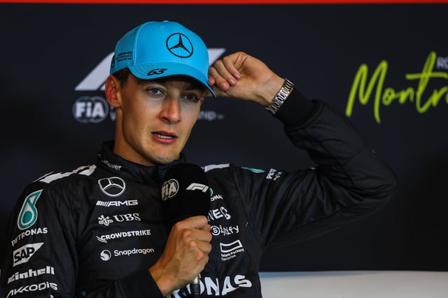 George Russell of Great Britain and Mercedes speaks in the FIA press conference following his race win during the F1 Grand Prix of Canada at Circuit Gilles-Villeneuve on June 15, 2025 in Montreal, Canada.