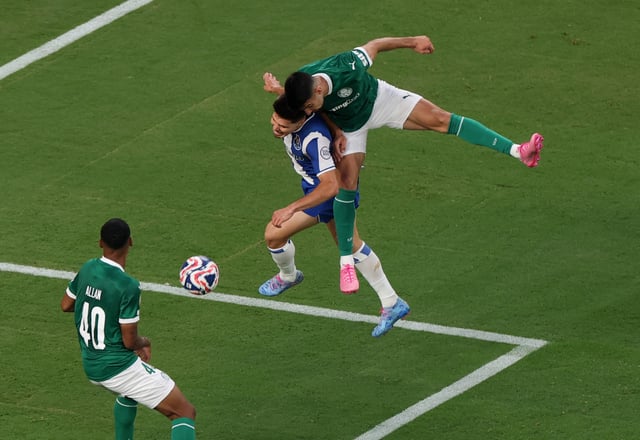 Soccer Football - FIFA Club World Cup - Group A - Palmeiras v FC Porto - MetLife Stadium, East Rutherford, New Jersey, U.S. - June 15, 2025 Palmeiras' Jose Lopez in action with FC Porto's Moura REUTERS/Mike Segar