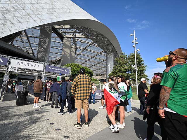 Fans wait in line to enter SoFi Stadium before a CONCACAF Gold Cup soccer match Saturday, June 14, 2025, in Inglewood, Calif. (AP Photo/Wally Skalij)