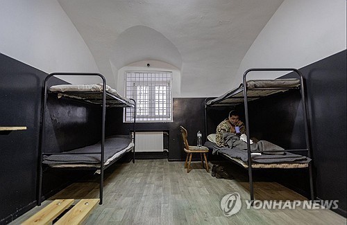 A wounded soldier, suspected to be North Korean and captured by Ukrainian forces in Russia's western Kursk region, is seen in this file photo posted on Ukrainian President Volodymyr Zelenskyy's X account on Jan. 12, 2025. (PHOTO NOT FOR SALE) (Yonhap)