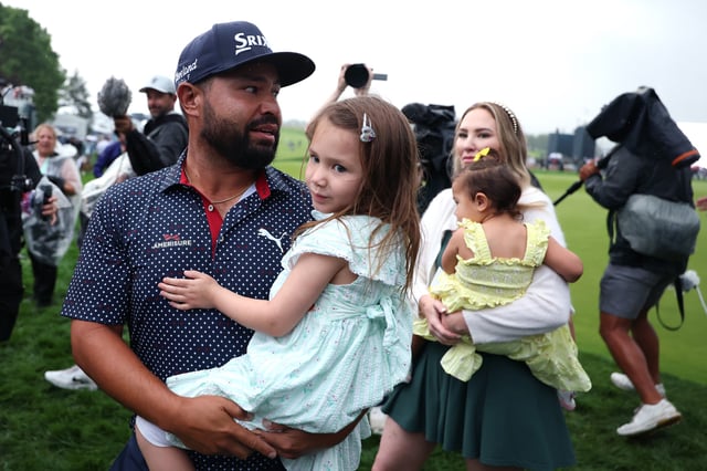 OAKMONT, PENNSYLVANIA - JUNE 15: J. J. Spaun of the United States celebrates with his wife and family after his winning putt on the 18th green during the final round of the 125th U.S. OPEN at Oakmont Country Club on June 15, 2025 in Oakmont, Pennsylvania.