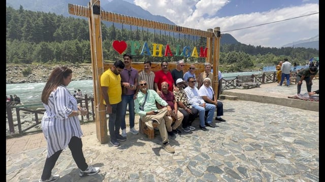 Tourists enjoying in Pahalgam, Anantnag, on Sunday. (PTI)