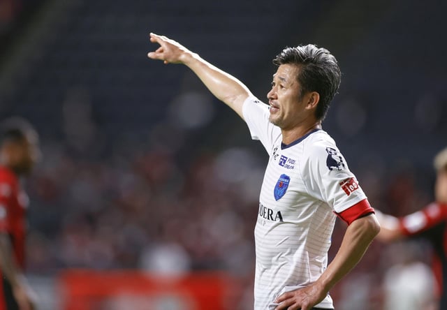 Yokohama FC's Japanese striker Kazuyoshi Miura who is recognised as the world's oldest goalscorer and oldest player currently playing in a professional league, gestures during J. League YBC Levain Cup soccer match against Hokkaido Consadole Sapporo in Sapporo, northern Japan August 12, 2020, in this photo taken by Kyodo. Picture taken August 12, 2020.  Mandatory credit Kyodo/via REUTERS/File Photo