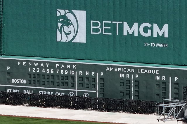 A drone view shows an advertisement for the online sports betting company BetMGM at Fenway Park in Boston, Massachusetts, U.S., June 18, 2024.  REUTERS/Brian Snyder/File Photo