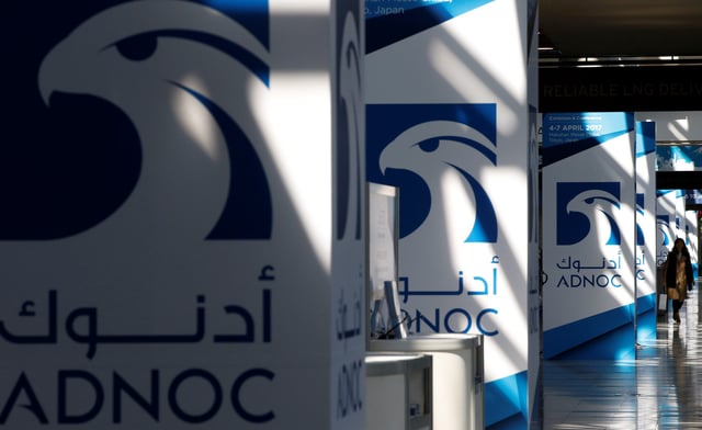 Logos of ADNOC are seen at Gastech, the world's biggest expo for the gas industry, in Chiba, Japan, April 4, 2017.    REUTERS/Toru Hanai/File Photo
