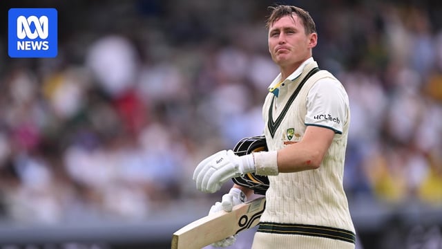 Marnus Labuschagne carries his bat, helmet and gloves