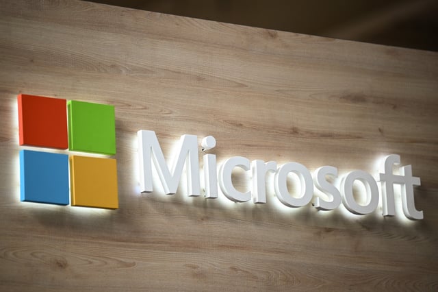 A Microsoft sign is pictured at a trade fair in Hannover Messe, in Hanover, Germany, April 22, 2024.  REUTERS/Annegret Hilse/File Photo