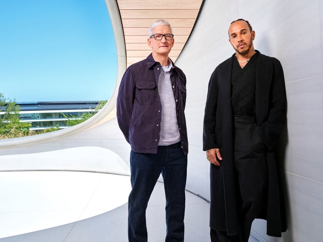 Apple CEO Tim Cook and Formula One driver Lewis Hamilton pose for a publicity photo at Apple Park in Cupertino, California, U.S., April 28, 2025.     Apple/Handout via REUTERS    THIS IMAGE HAS BEEN SUPPLIED BY A THIRD PARTY. NO RESALES. NO ARCHIVES