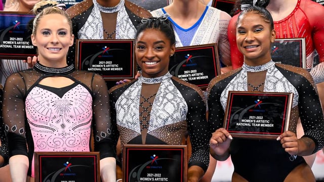 USA gymnasts MyKayla Skinner, left, Simone Biles, center, and Jordan Chiles pose for a photo after the U.S. Championships at Dickies Arena.