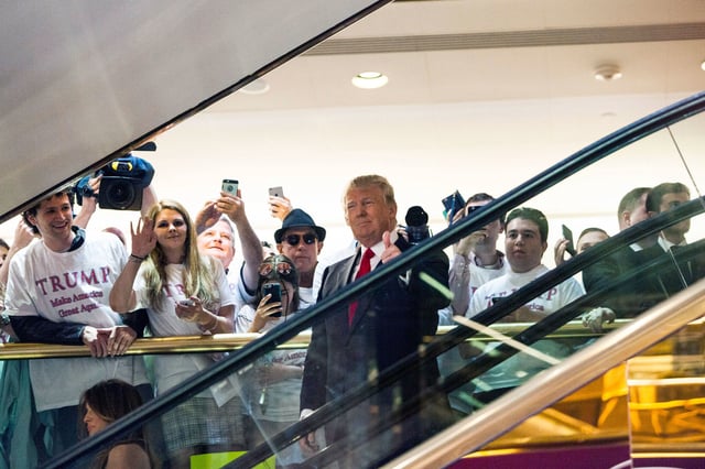 Donald Trump rides an escalator to a press event to announce his candidacy for the presidency at Trump Tower on June 16, 2015, in New York City.