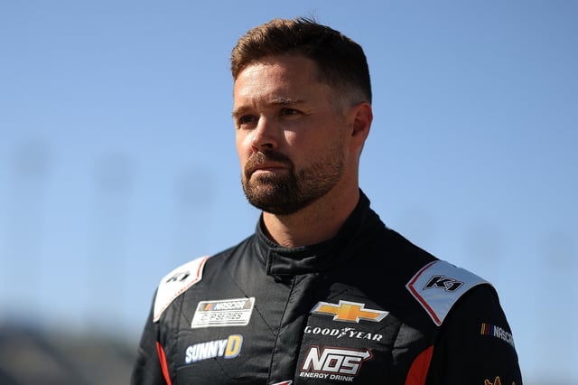 Ricky Stenhouse Jr., driver of the #47 Fun Pops Chevrolet, looks on during qualifying for the NASCAR Cup Series AdventHealth 400 at Kansas Speedway on May 10, 2025 in Kansas City, Kansas.