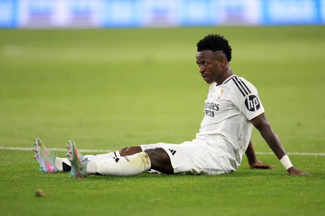 Soccer Football - Copa del Rey - Final - FC Barcelona v Real Madrid - Estadio de La Cartuja, Seville, Spain - April 26, 2025 Real Madrid's Vinicius Junior reacts after sustaining an injury REUTERS/Borja Suarez/File Photo
