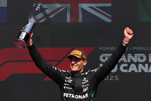 Race winner George Russell of Great Britain and Mercedes AMG Petronas F1 Team lifts the winners trophy on the podium during the F1 Grand Prix of Canada at Circuit Gilles-Villeneuve on June 15, 2025 in Montreal, Quebec.