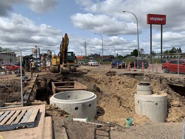 Traffic along East Main Street in Moncton is reduced to two lanes as construction to install underground pipes is ongoing. 