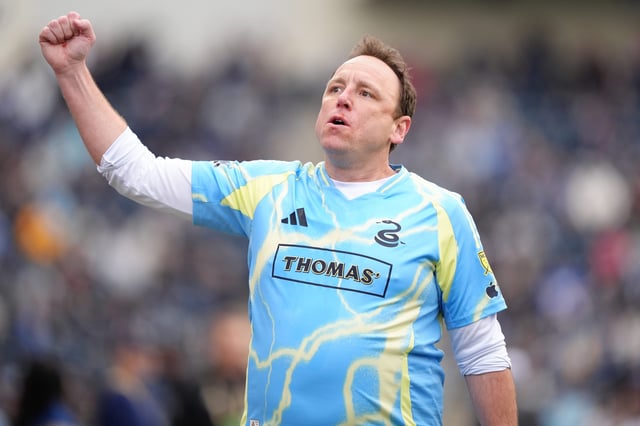 Competitive eater Joey Chestnut entertains fans during a soccer game between the Philadelphia Union and Nashville SC at Subaru Park on March 16, 2025.