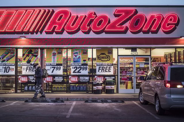 A man walks outside an AutoZone store in Albuquerque, New Mexico.