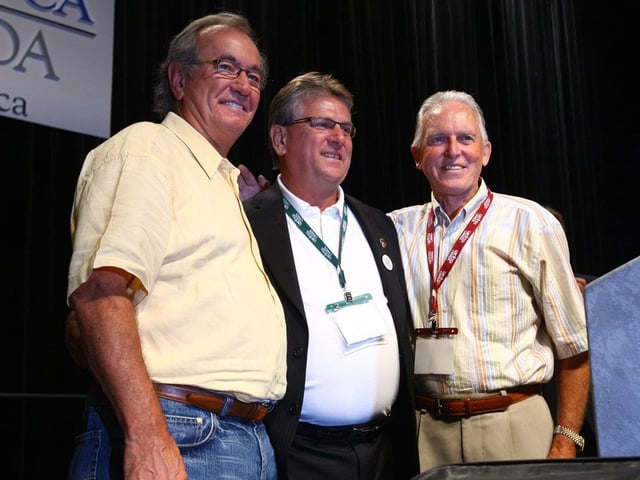 In this Sept. 6, 2008, file photo, incoming Canadian Auto Workers national president Ken Lewenza, centre, celebrates his new post with former presidents Buzz Hargrove, left, and Bob White during a special convention in Toronto.