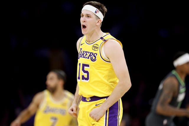 LOS ANGELES, CALIFORNIA - APRIL 30: Austin Reaves #15 of the Los Angeles Lakers reacts after a made basket against the Minnesota Timberwolves during the fourth quarter in Game Five of the Western Conference First Round NBA Playoffs at Crypto.com Arena on April 30, 2025 in Los Angeles, California.