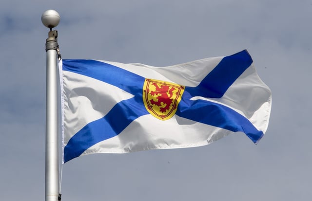 Nova Scotia's provincial flag flies on a flagpole in Ottawa on June 30, 2020. THE CANADIAN PRESS/Adrian Wyld