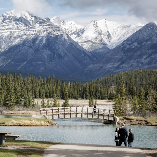 Visitors explore Cascade Ponds in Banff National Park, Alta., Thursday, May 15, 2025. THE CANADIAN PRESS/Jeff McIntosh
