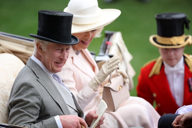 Horse Racing - Royal Ascot 2024 - Ascot Racecourse, Ascot, Britain - June 22, 2024 Britain's King Charles and Queen Camilla during the Royal procession ahead of the races Action Images via Reuters/Andrew Boyers/File Photo