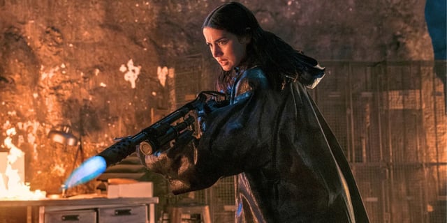 Ana De Armas as Eve holding a flamethrower in Ballerina.