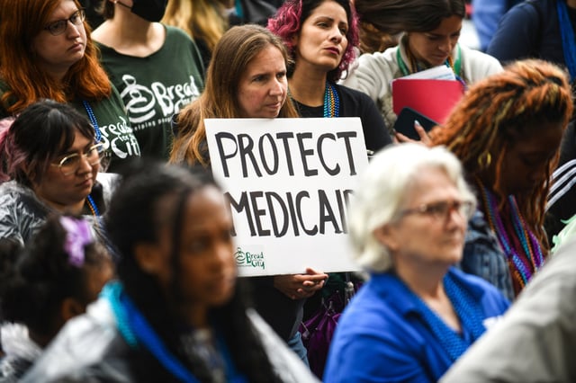 People protest the upcoming Medicaid cuts in Washington, D.C., May 22, 2025.