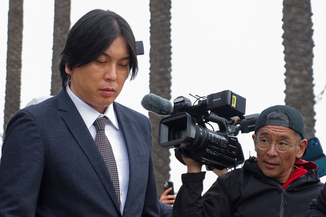 Ippei Mizuhara, the former interpreter for Japanese baseball star Shohei Ohtani, leaves the federal court, on the day of sentencing after pleading guilty to bank fraud and tax-evasion charges, in Santa Ana, California, U.S., February 6, 2025. REUTERS/Mike Blake/File Photo