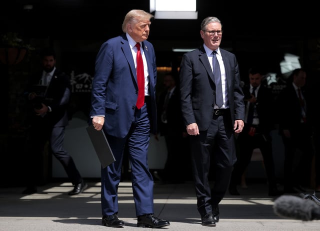 President Donald Trump and British Prime Minister Keir Starmer walk together after singing a trade deal as they leave a bilateral meeting during the G7 Leaders' Summit on June 16, 2025 in Kananaskis, Alberta.