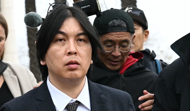 Ippei Mizuhara (R) leaves the Ronald Reagan Federal Building and Courthouse in Santa Ana, California, on February 6, 2025. The former interpreter to Shohei Ohtani, who admitted stealing almost $17 million from the Japanese baseball star to pay off illegal gambling debts, was sentenced to 57 months in prison on February 6. Mizuhara was also ordered to pay restitution of more than $18.1 million in his sentencing in federal court. (Photo by Patrick T. Fallon / AFP) (Photo by PATRICK T. FALLON/AFP via Getty Images)