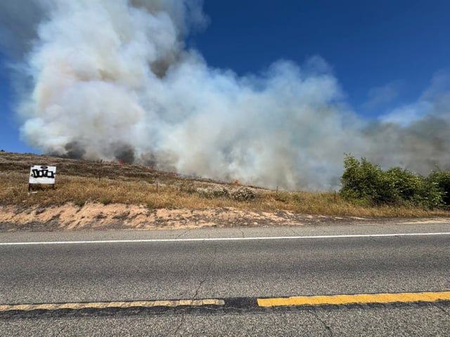 A brush fire, dubbed the Mission fire, broke out Monday afternoon on South Mission Road in Bonsall. (Cal Fire San Diego)