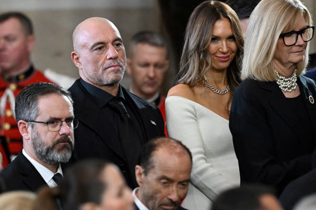 US media personality Joe Rogan stands for a benediction after President Donald Trump was sworn in as the 47th US President in the US Capitol Rotunda in Washington, DC, on January 20, 2025.     SAUL LOEB/Pool via REUTERS/File Photo