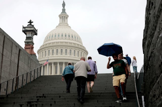 Tourists walk near the US Capitol visitor center on June 16 in Washington, DC.
