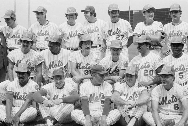 FILE - The 1969 New York Mets, pose for a 10th anniversary reunion photo at New York's Shea Stadium Saturday, July 14, 1979. Present at the Old Timers' Day were, top row, from left: Ken Boswell, Ron Taylor; Ron Swoboda, Ed Kranepool, Don Cardwell, Jim McAndrew, and Gary Gentry. Second row: Art Shamsky, Donn Clendenon, Jack DiLauro, J.C. Martin, Tommie Agee and Ed Charles. Third row: Cleon Jones, Joe Pinatano, Rube Walker, Jerry Grote, and Al Weis. (AP Photo/Bob Schutz,File)