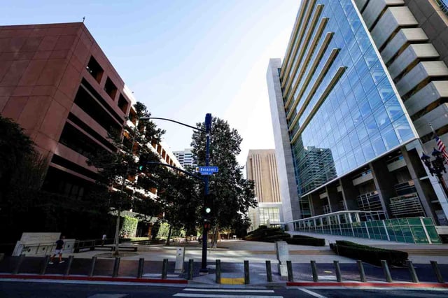The Edward J. Schwartz United States Courthouse, left, and James M. Carter &amp; Judith N. Keep United States Courthouse, right, in San Diego. (Meg McLaughlin / U-T file)