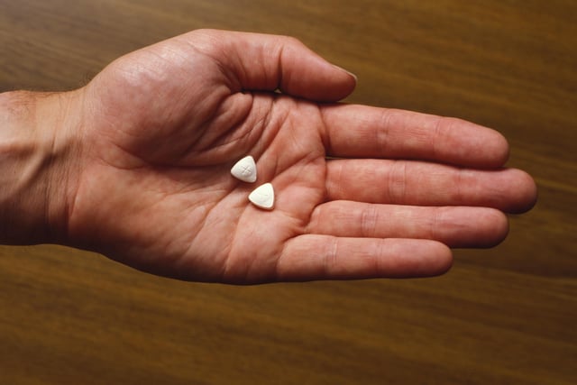 Ecstasy pills in hand (Photo by PYMCA/Avalon/Getty Images)