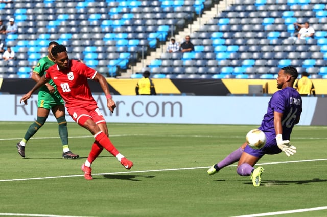 Panama forward Ismael Díaz, left, scores a goal past Guadeloupe goalkeeper Brice Cognard during the first half of a CONCACAF Gold Cup group play match on Monday, June 16, 2025, at Dignity Health Sports Park in Carson. Diaz scored two goals in the first 17 minutes of Panama’s 5-2 win. (Photo by Raul Romero Jr., Contributing Photographer)
