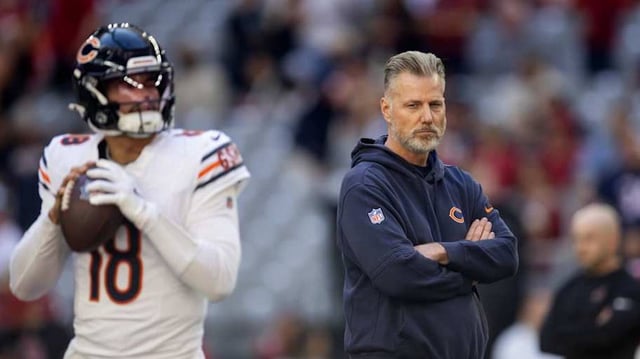 Nov 3, 2024; Glendale, Arizona, USA; Chicago Bears head coach Matt Eberflus watches quarterback Caleb Williams (18) prior to the game against the Arizona Cardinals at State Farm Stadium. Mandatory Credit: Mark J. Rebilas-Imagn Images