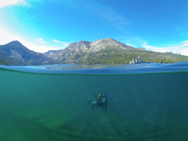 Katie Senft of UC Davis TERC dives in Lake Tahoe. The lake’s famed blue waters became significantly murkier in 2024, with average clarity plunging to 62.3 feet — the third lowest on record. 
