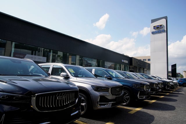 Geely vehicles and logo are seen at a car dealership in Shanghai, China August 17, 2021. Picture taken August 17, 2021. REUTERS/Aly Song/File Photo