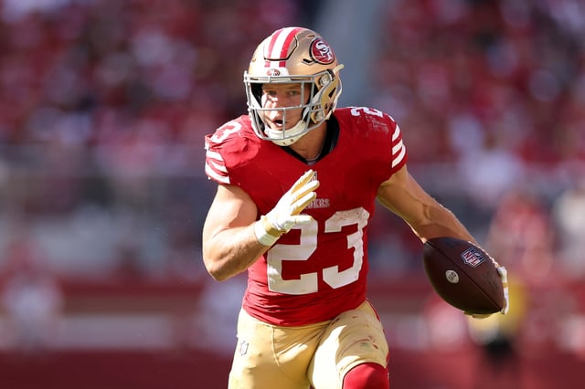 Christian McCaffrey #23 of the San Francisco 49ers runs with the ball against the Arizona Cardinals at Levi&#39;s Stadium on October 01, 2023 in Santa Clara, California.