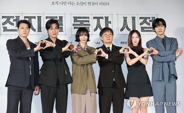 Director Kim Byung-soo (3rd from R) and cast members of the action fantasy "Omniscient Reader: The Prophet" pose for photos during a press conference in Seoul on June 17, 2025. (Yonhap)