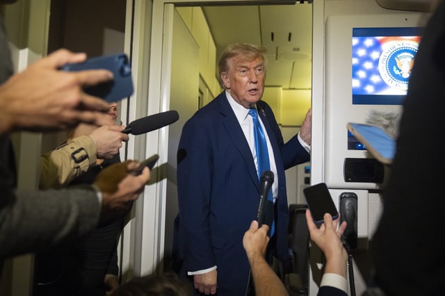 President Donald Trump speaks with reporters while flying aboard Air Force One en route from Calgary, Canada to Joint Base Andrews, Md., late Monday, June 16, 2025.