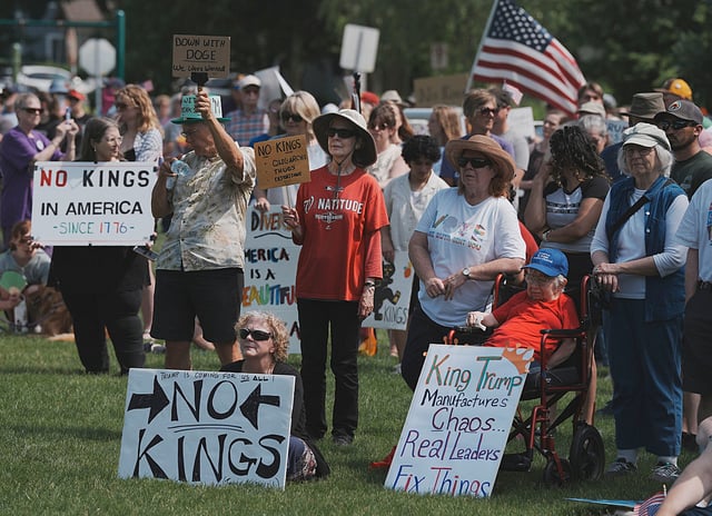 Protesters gather for the "No Kings" rally on June 14, 2025, in Ames, Iowa.