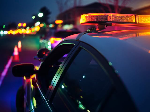 A police car at night.