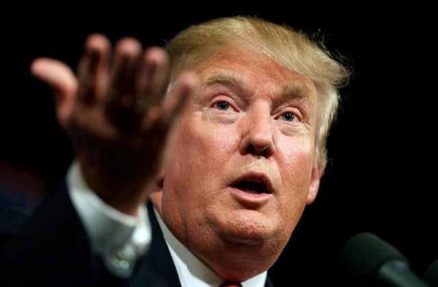 In this June 16, 2015 file photo, Republican presidential candidate Donald Trump speaks to supporters during a rally in Des Moines, Iowa. (AP Photo/Charlie Neibergall, File)